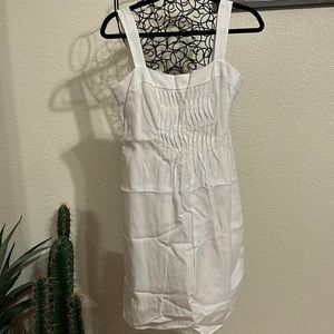 ELIE TAHARI Solid White Sleeveless Dress never been worn. Size 4